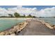 Scenic path to beach with people enjoying the sun at 121 Preserve Pl # A, Nokomis, FL 34275