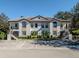 Exterior view of a charming building with parking at 121 Preserve Pl # A, Nokomis, FL 34275