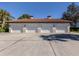 Four-car garage with individual doors and ample parking space at 121 Preserve Pl # A, Nokomis, FL 34275