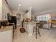 Updated kitchen with granite countertops and black appliances at 121 Preserve Pl # A, Nokomis, FL 34275