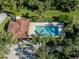 Community pool with surrounding patio and lounge chairs at 121 Preserve Pl # A, Nokomis, FL 34275