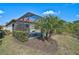 Landscaped backyard featuring a pool and spa at 125 Soliera St, Nokomis, FL 34275