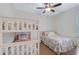 Well-lit bedroom with a bunk bed and a full-size bed at 125 Soliera St, Nokomis, FL 34275