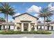 Community clubhouse with stone exterior and palm trees at 125 Soliera St, Nokomis, FL 34275