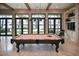 Game room featuring a billiard table and large windows at 125 Soliera St, Nokomis, FL 34275