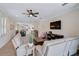 Open concept living room showcasing a seamless flow into the kitchen and dining area at 125 Soliera St, Nokomis, FL 34275