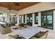 Relaxing outdoor lounge area with comfortable seating at 125 Soliera St, Nokomis, FL 34275
