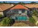 Private screened pool and spa with patio in backyard at 125 Soliera St, Nokomis, FL 34275