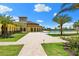 Expansive pool area with adjacent clubhouse, creating a resort-like atmosphere at 12704 Richezza Dr, Venice, FL 34293