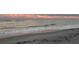Sandy beach with ocean waves at 12837 Oriago St, Venice, FL 34293
