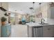 Modern kitchen with stainless steel appliances and granite countertops at 12837 Oriago St, Venice, FL 34293