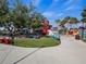 Inviting outdoor seating area with colorful chairs, lush greenery, and a variety of food vendors nearby at 12837 Oriago St, Venice, FL 34293