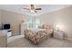 Bedroom with a full-size bed and a ceiling fan at 13156 Dodds Ct, Port Charlotte, FL 33953