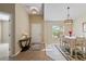 Bright dining area with white table and neutral decor at 13156 Dodds Ct, Port Charlotte, FL 33953