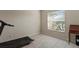 Home office with a treadmill and built-in desk at 13156 Dodds Ct, Port Charlotte, FL 33953