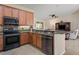 Spacious kitchen with stainless steel appliances and granite countertops at 13156 Dodds Ct, Port Charlotte, FL 33953