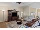Spacious living room with comfortable seating and entertainment center at 13156 Dodds Ct, Port Charlotte, FL 33953