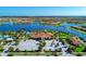 Community clubhouse with parking and lake views at 13280 Esposito St, Venice, FL 34293