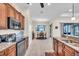 Bright kitchen featuring granite counters and a breakfast nook at 1493 Navigator Rd, Punta Gorda, FL 33983