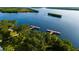 Two wooden docks extending into the calm water at 1493 Navigator Rd, Punta Gorda, FL 33983