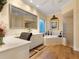 Elegant bathroom with soaking tub, walk-in shower, and dual sinks at 1720 Grande Park Dr, Englewood, FL 34223