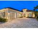 Two-car garage and inviting entryway of a beautiful house at 1720 Grande Park Dr, Englewood, FL 34223