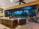 Relaxing outdoor space with a pool, spa, and covered patio at 1720 Grande Park Dr, Englewood, FL 34223