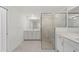 Double vanity bathroom with large shower at 17585 Boracay Ct # 101, Venice, FL 34293