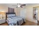 Spacious bedroom with a double bed and access to a shared bathroom at 20263 Hamilton Ave, Port Charlotte, FL 33952