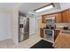 Kitchen with stainless steel appliances and wood cabinets at 20263 Hamilton Ave, Port Charlotte, FL 33952