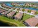 Bird's eye view of lakefront homes and community at 20272 Tesoro Dr, Venice, FL 34293