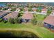 Community view showcasing lakefront properties at 20272 Tesoro Dr, Venice, FL 34293