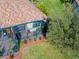 Aerial view of home with a large screened patio at 20272 Tesoro Dr, Venice, FL 34293