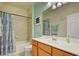 Bathroom with light wood vanity and a shower/tub combo at 20272 Tesoro Dr, Venice, FL 34293
