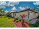 Beautiful home with landscaped yard and two-car garage at 20272 Tesoro Dr, Venice, FL 34293