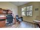Home office with hardwood floors and window views at 20272 Tesoro Dr, Venice, FL 34293