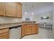 Modern kitchen with stainless steel appliances and light wood cabinets at 20272 Tesoro Dr, Venice, FL 34293