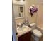 Clean bathroom with a shower/tub combo and vanity at 223 Roma Rd, Venice, FL 34285