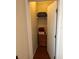 Small closet with storage shelving and dresser at 223 Roma Rd, Venice, FL 34285