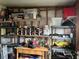 Well-organized garage with ample shelving and storage at 223 Roma Rd, Venice, FL 34285