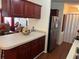 Kitchen with ample cabinetry and a breakfast bar at 223 Roma Rd, Venice, FL 34285
