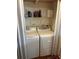 Laundry closet with washer and dryer at 223 Roma Rd, Venice, FL 34285
