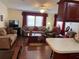 Living room with comfortable seating and kitchen view at 223 Roma Rd, Venice, FL 34285