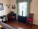 Home office space with a corner desk and chairs at 223 Roma Rd, Venice, FL 34285