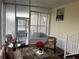 Bright screened porch with access to yard at 223 Roma Rd, Venice, FL 34285