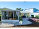 Screened patio with seating area and small grilling station at 2295 Hibiscus St, Sarasota, FL 34239