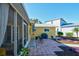 Small patio with table and chairs, adjacent to the house at 2295 Hibiscus St, Sarasota, FL 34239