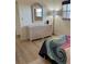 Bedroom with dresser and wicker mirror at 232 Saint Augustine Ave # 404, Venice, FL 34285