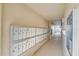 Neat row of mailboxes in a condo building hallway at 232 Saint Augustine Ave # 404, Venice, FL 34285