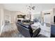 Open concept living area with hardwood floors and high ceilings at 3328 Waterloo Ter, North Port, FL 34286